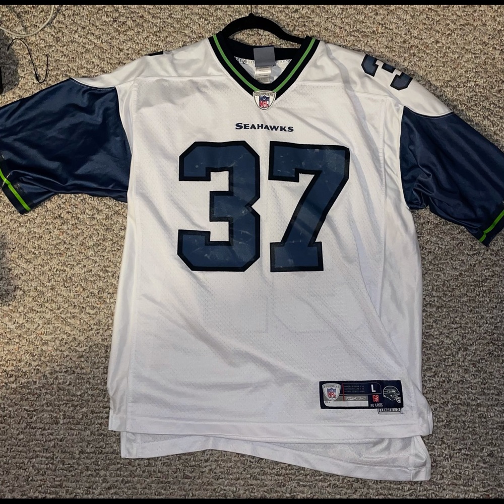 Throwback Shaun  Alexander Seahawks jersey. Faded numbers due to age and washing